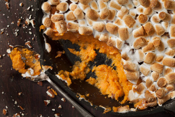 istock Sweet Potato Casserole with Pecans and Marshmallows 1287113084