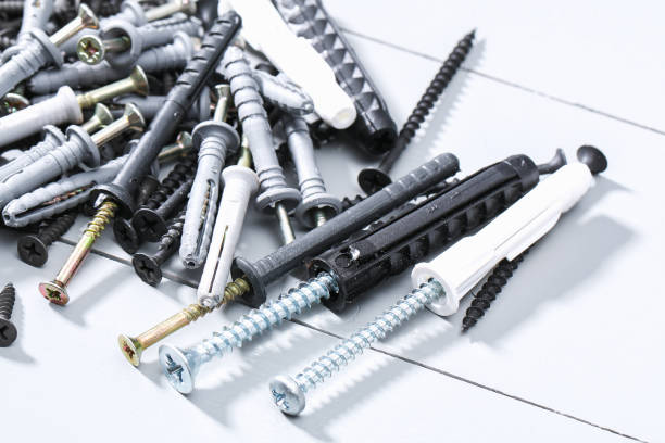 istock Black iron screws, dowel nails for wood, concrete. Fasteners, hardware. 1287113160
