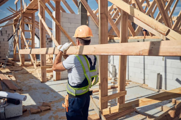 istock Strong young male person carrying long beam 1287114065