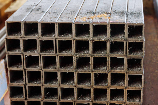 istock Metal profile pipe of rectangular cross section in packs 1287116702