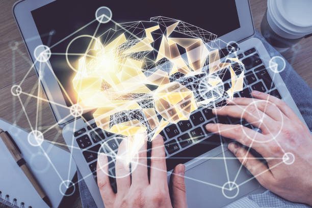 istock Double exposure of man's hands typing over computer keyboard and brain hologram drawing. Top view. Ai and data technology concept. 1287116766