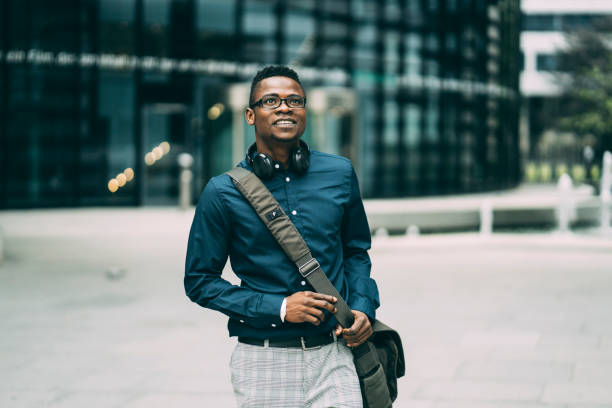 istock Afro man in front of cityscape 1287119539