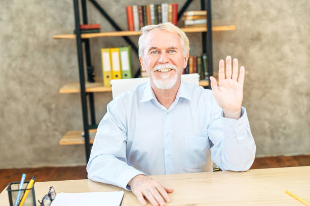 istock Senior grey haired man in smart casual wear 1287121093