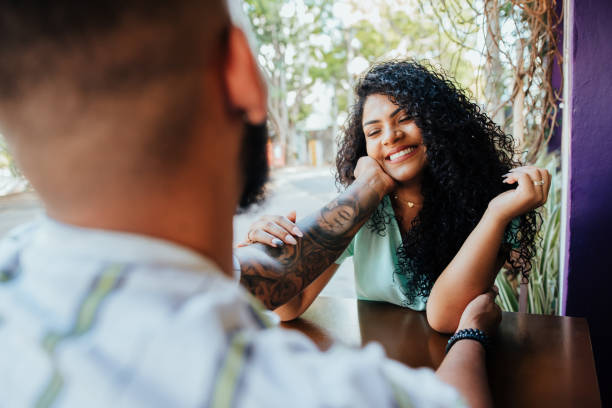 istock Romantic couple cuddling with their hands 1287124128