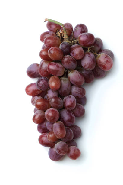 Bunch of red grapes on white.