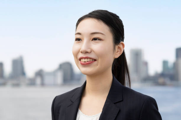 istock Young business woman with a smile 1287128779