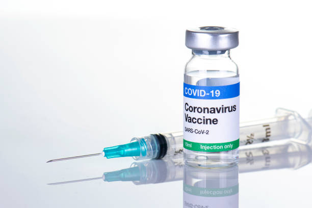 istock Coronavirus vaccine vial and hypodermic syringe 1287135223