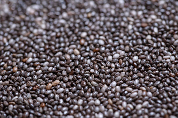 Macro photo of the chia seeds. View from above. Macro photo of the chia seeds. View from above, small depth of focus. Healthy superfood. salvia hispanica plant stock pictures, royalty-free photos & images