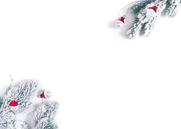 istock Christmas, New Year composition. Snow-covered fir branches and decorations are on a white background. Flat lay, top view, copy space. 1287150234