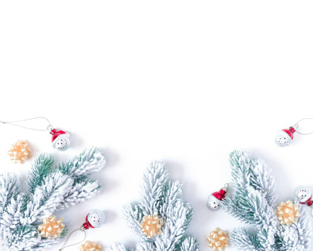 istock Christmas, New Year composition. Snow-covered fir branches and decorations are on a white background. Flat lay, top view, copy space. 1287150299