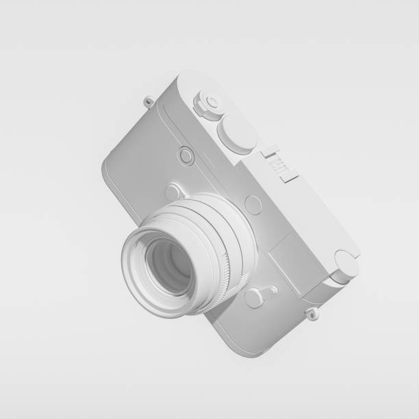 istock Abstract Image of White Painted Camera, Falling, Floating, Suspended, Isolated Against White 1287151826