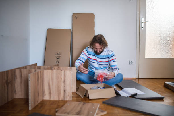 istock Mature Man Reading The Manual Instructions And Holding Work Tools 1287151920