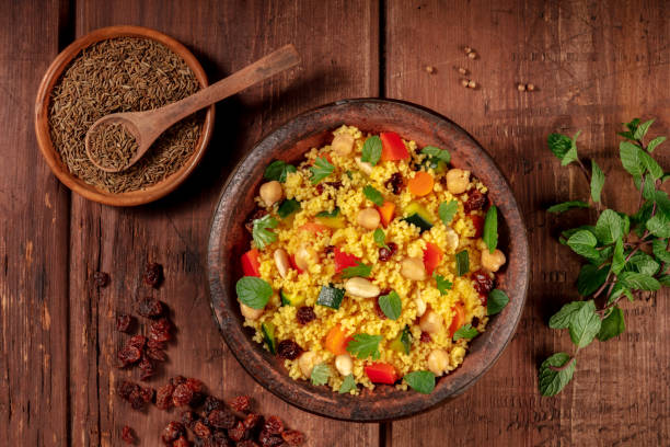 istock Couscous, a flat lay shot in a tagine with ingredients 1287157993