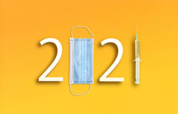 istock Year 2021 with Surgical Face Mask 1287158315