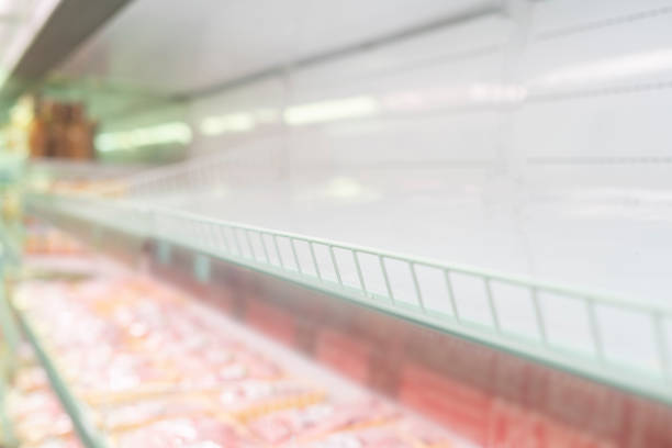 istock empty grocery store shelves, no food, crisis problems 1287158935