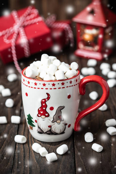 istock Cup of creamy hot chocolate with melted marshmallows 1287160153