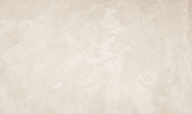 Cream concreted wall for interiors or outdoor exposed surface polished concrete. Cement have sand and stone of tone vintage, natural patterns old antique, design art work floor texture background.