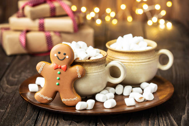istock Christmas composition with gingerbread cookies  and hot drink in mug 1287160169
