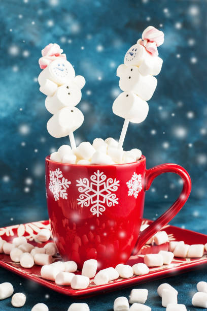 istock Red mug filled with hot chocolate and marshmallows 1287160181