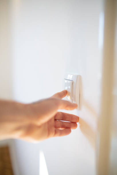 istock Hand ringing the doorbell 1287162252