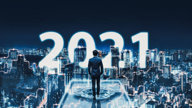 istock New year 2021 business man on future network night city 1287163546