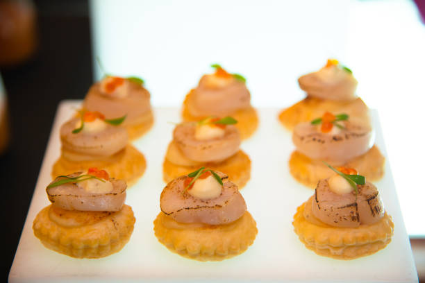 istock scallop canepe on white tray 1287164306