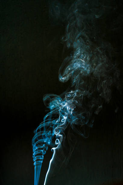istock smoke cloud with black background. fog texture 1287164573