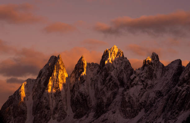 istock First morning light lightening the Devil's teeth rock formation in Senja, Norway. 1287166049