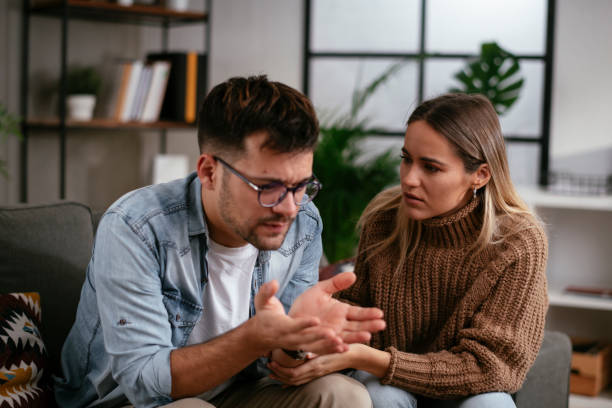 istock Girlfriend comforting her sad boyfriend. 1287167236