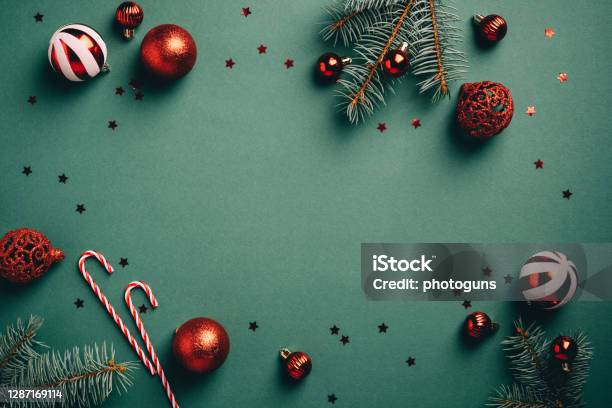 Vintage Christmas Background With Red And White Balls Decoration Fir Tree Branches Candy Canes Confetti Retro Christmas Card Template Stock Photo - Download Image Now