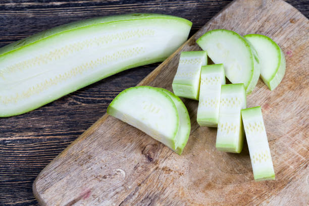cut into parts ripe delicious zucchini, cut into parts ripe delicious zucchini, for cooking and sauces, close-up of food products of natural origin Relish stock pictures, royalty-free photos & images