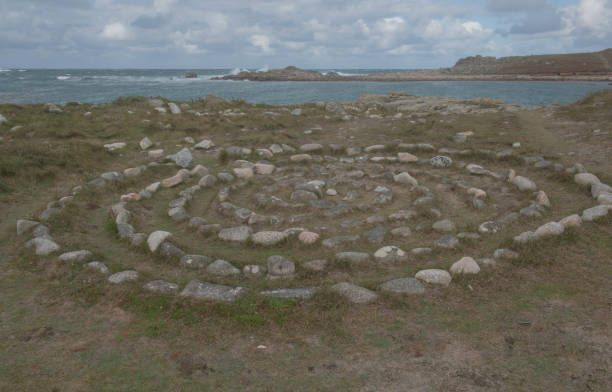 Stone Circle by the Sea on the Coast of the Island of Bryher in the Isles of Scilly, England, UK The Isles of Scilly are an Archipelago off the Coast of Cornwall with 5 Inhabited Islands. tresco stock pictures, royalty-free photos & images