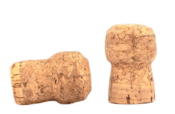 istock Two corks of champagne close-up on a white background. 1287169476