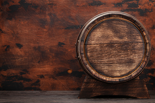 Metal rings with rivets on old cask. Find more in