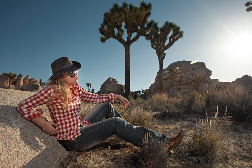 portrait of young beautiful girl in Joshua Tree park environment