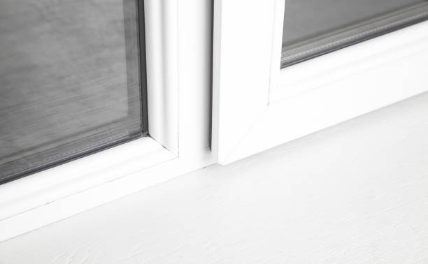 istock View of window with empty white sill. 1287172627