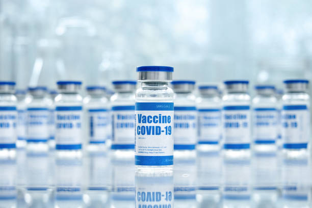 Covid 19 corona virus vaccine vial bottles for intramuscular injections on medical pharmaceutical industry background. Coronavirus cure manufacture, flu treatment drug pharmacy production concept. Covid 19 corona virus vaccine vial bottles for intramuscular injections on medical pharmaceutical industry background. Coronavirus cure manufacture, flu treatment drug pharmacy production concept. insta stock pictures, royalty-free photos & images