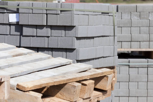 istock empty wooden pallets and new construction tiles 1287173713