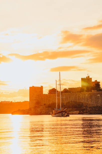 The Bodrum Castle of St. Peter and marina with boats in Bodrum city. Bodrum is a city in Mugla Province, Turkey.