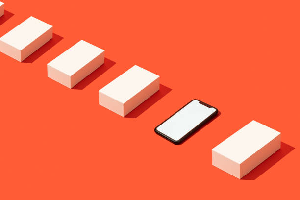 istock Smart phone mockup with white gift box flat lay on red background 1287175762