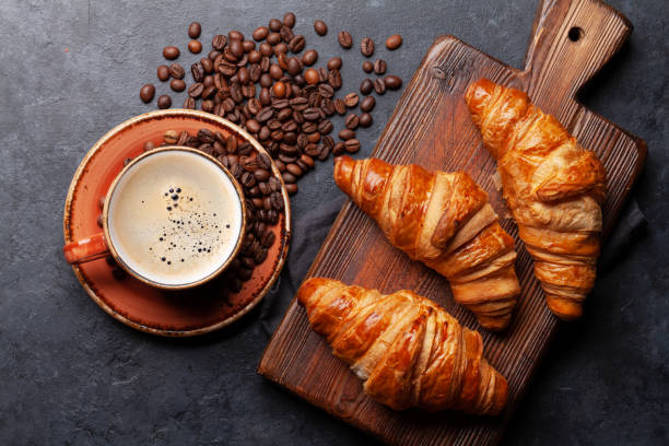 istock Espresso coffee and croissants for breakfast 1287175890