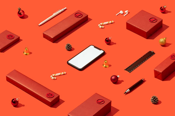 istock Smart phone mockup, template on red background with red gift boxes 1287176517