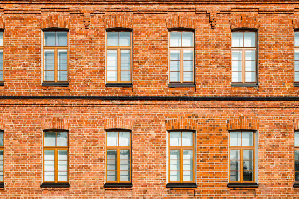 istock Beautiful vintage red brick building at sunny day 1287181760