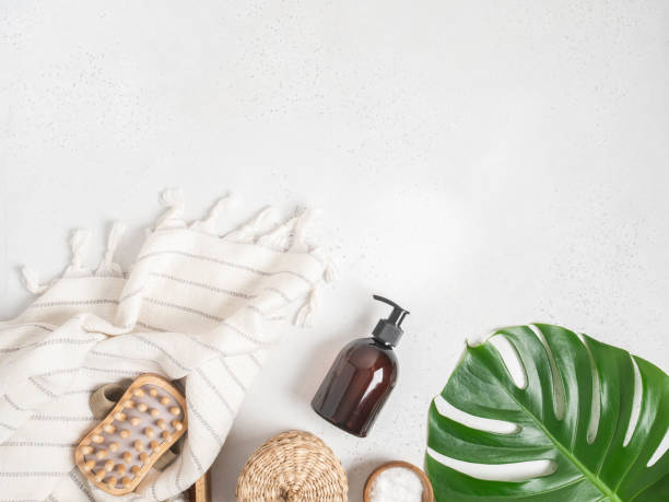 istock Flat lay of bath accessories and products on light gray background. 1287181928