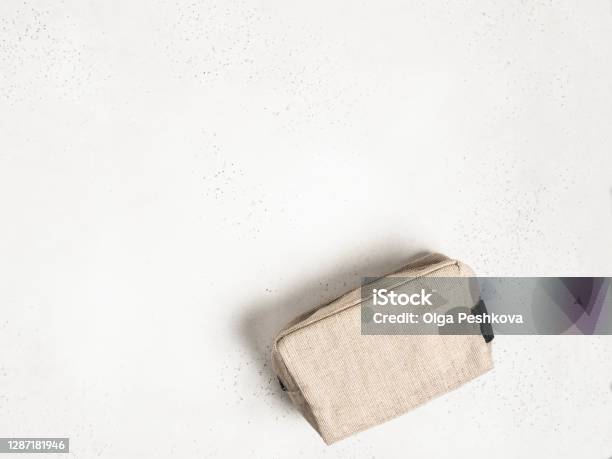 Eco Textile Cosmetic Bag On Grey Background Stock Photo - Download Image Now - Make-Up Bag, Open, Travel