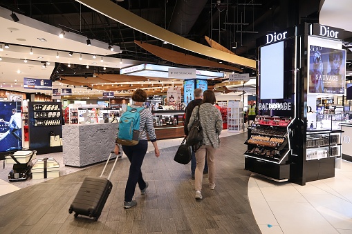 Passengers visit duty free shops at London Luton Airport in the UK. It is UK's 5th busiest airport with 16.5 million annual passengers.