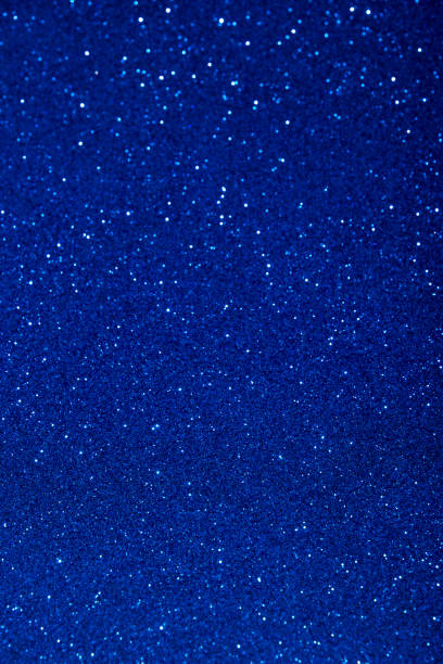 istock Blue color blurred sparkling background with focused area. 1287184695