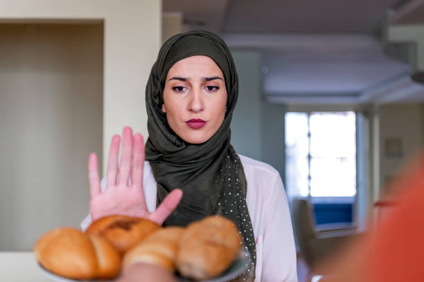 istock Muslim Woman Refusing an Unhealthy Food 1287185042