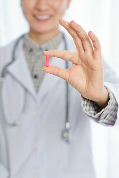 istock Doctor showing effective painkiller 1287186121