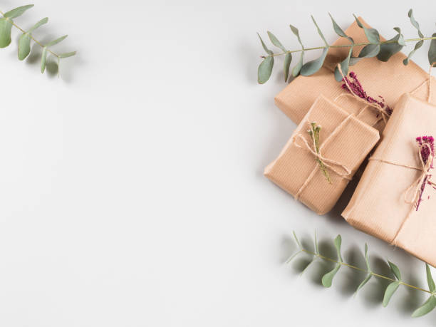 istock Gift boxes wrapped in craft paper with dried flowers 1287186306